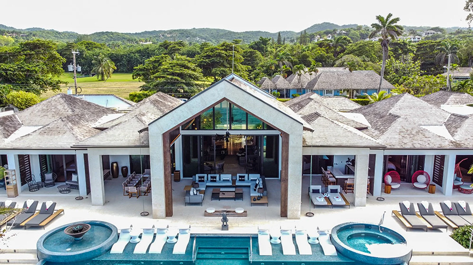 A grand modern villa pavilion with twin pools